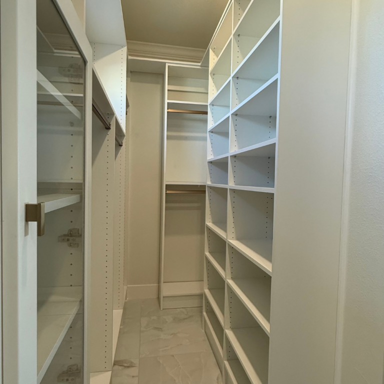 Dressing room with glass-door cabinets and a drawer wall – photo 3
